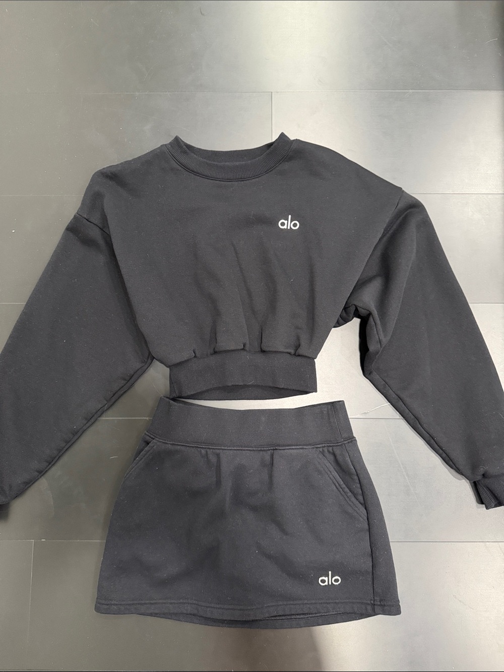 ALO Yoga Black Cropped Sweatshirt and Matching Skirt Set
